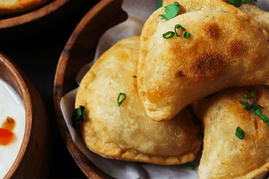 What to eat with perogies! Whether you’re serving perogies as a side dish or main dish, here are tons of delicious ways to make it a great meal.