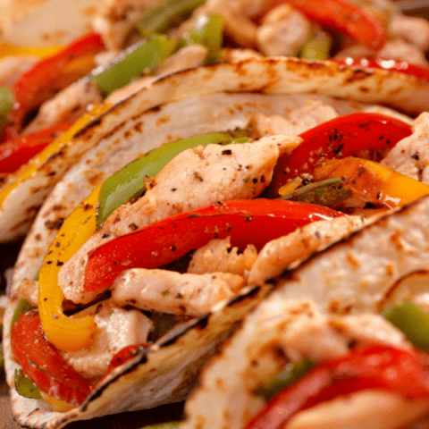 Flavorful and super easy, these baked chicken fajitas make any night feel like a fiesta.