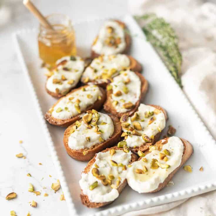 Image for Whipped Ricotta Crostini with Honey and Pistachios 